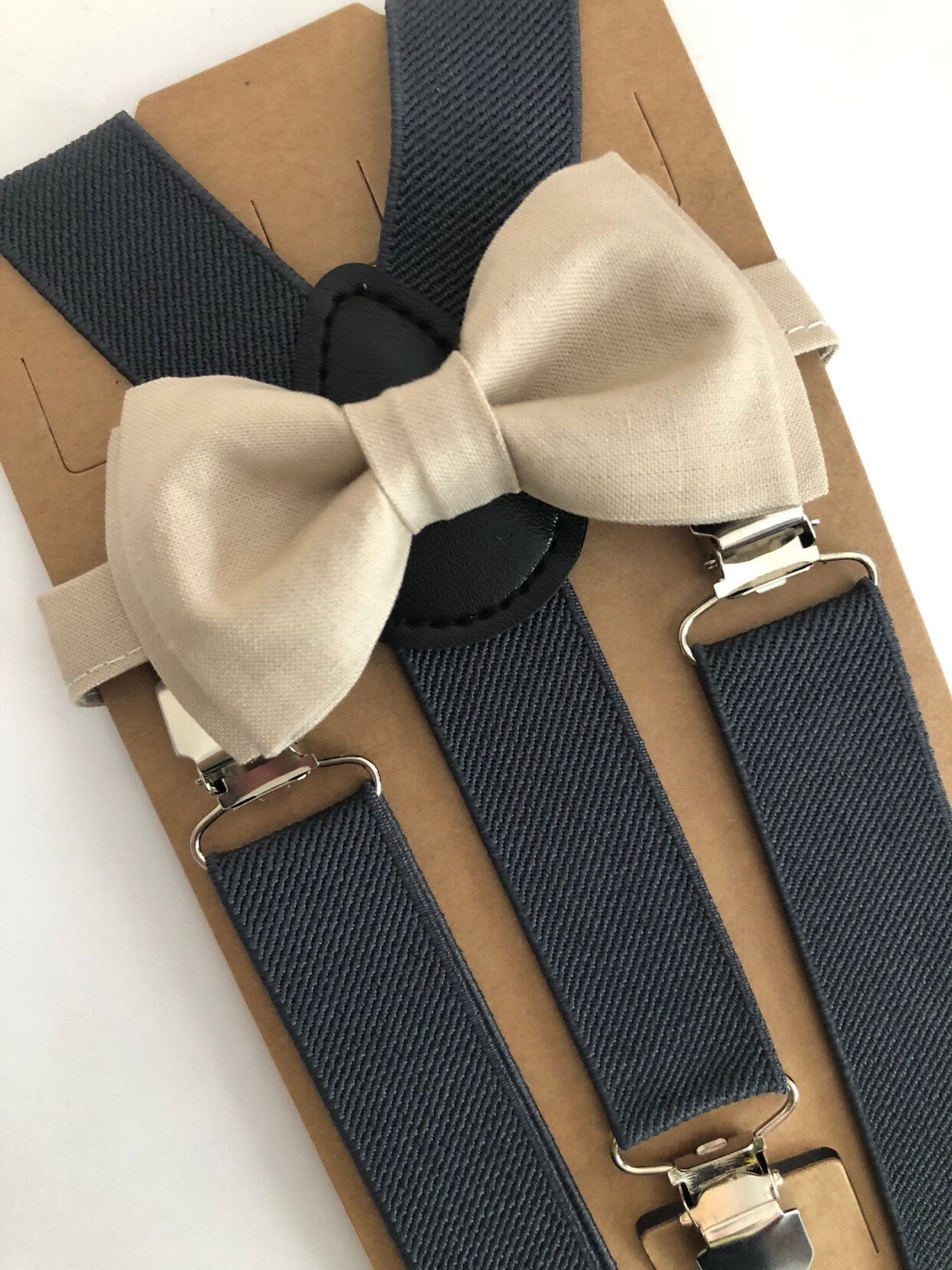 Champagne Bow Tie and Dark Grey Suspenders.