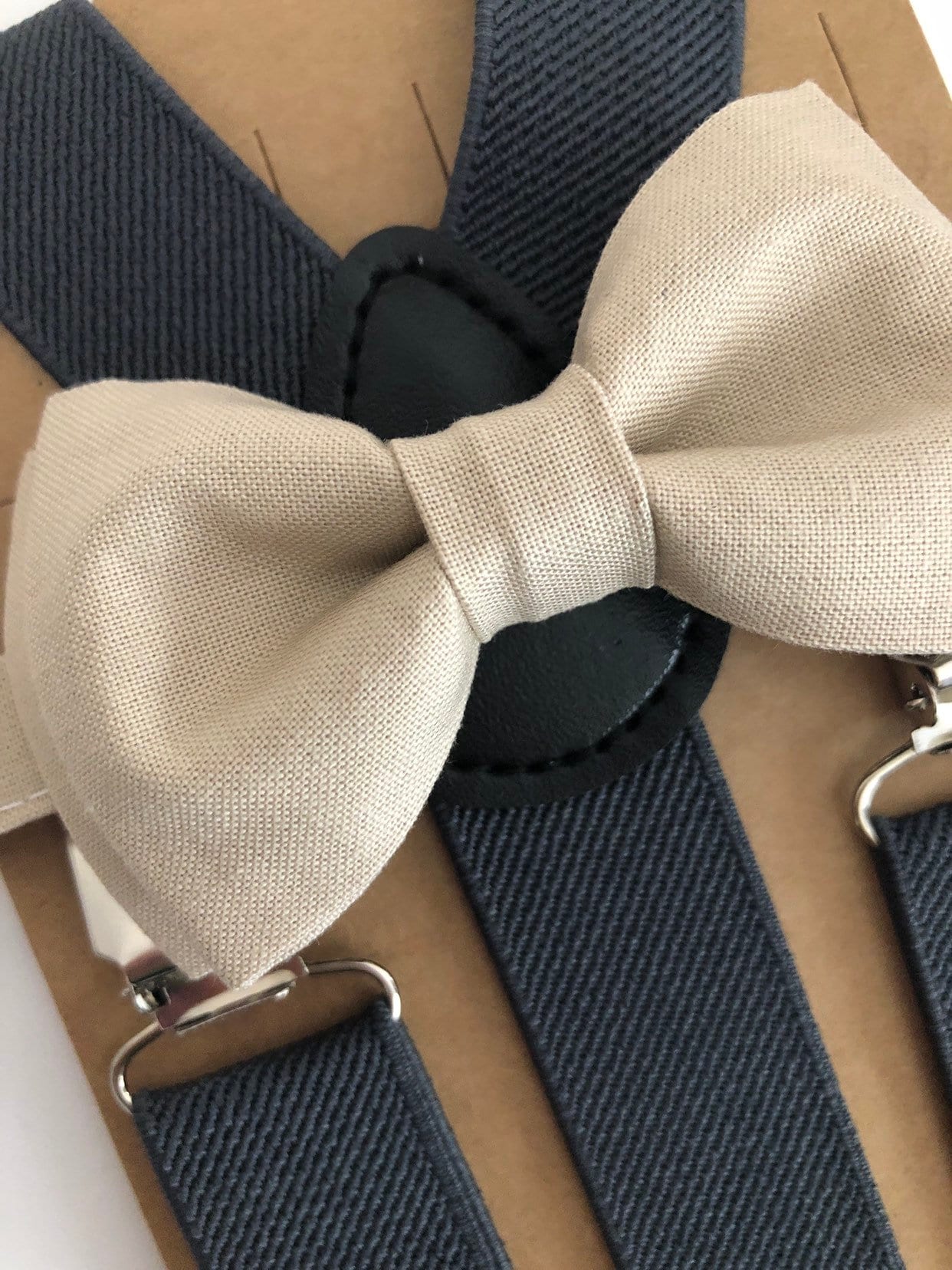 Champagne Bow Tie and Dark Grey Suspenders.