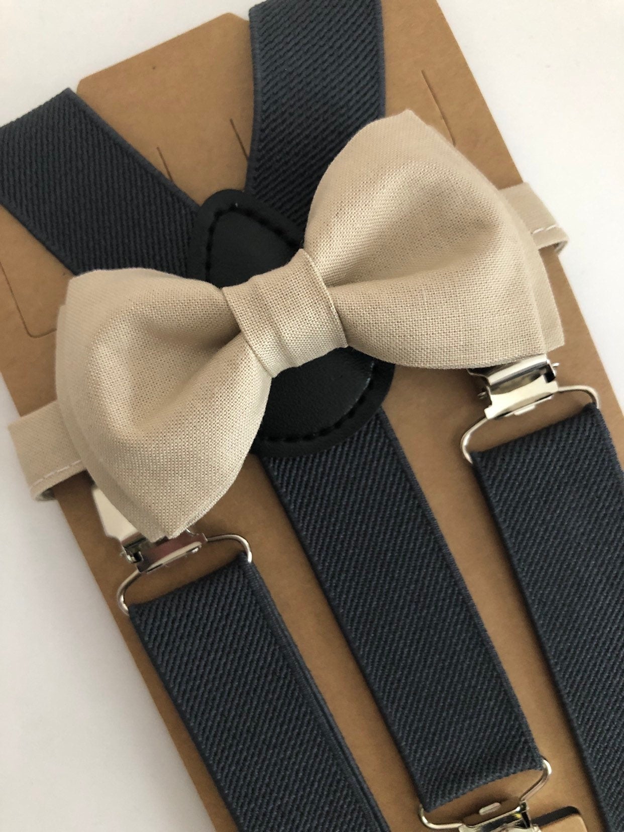 Champagne Bow Tie and Dark Grey Suspenders.