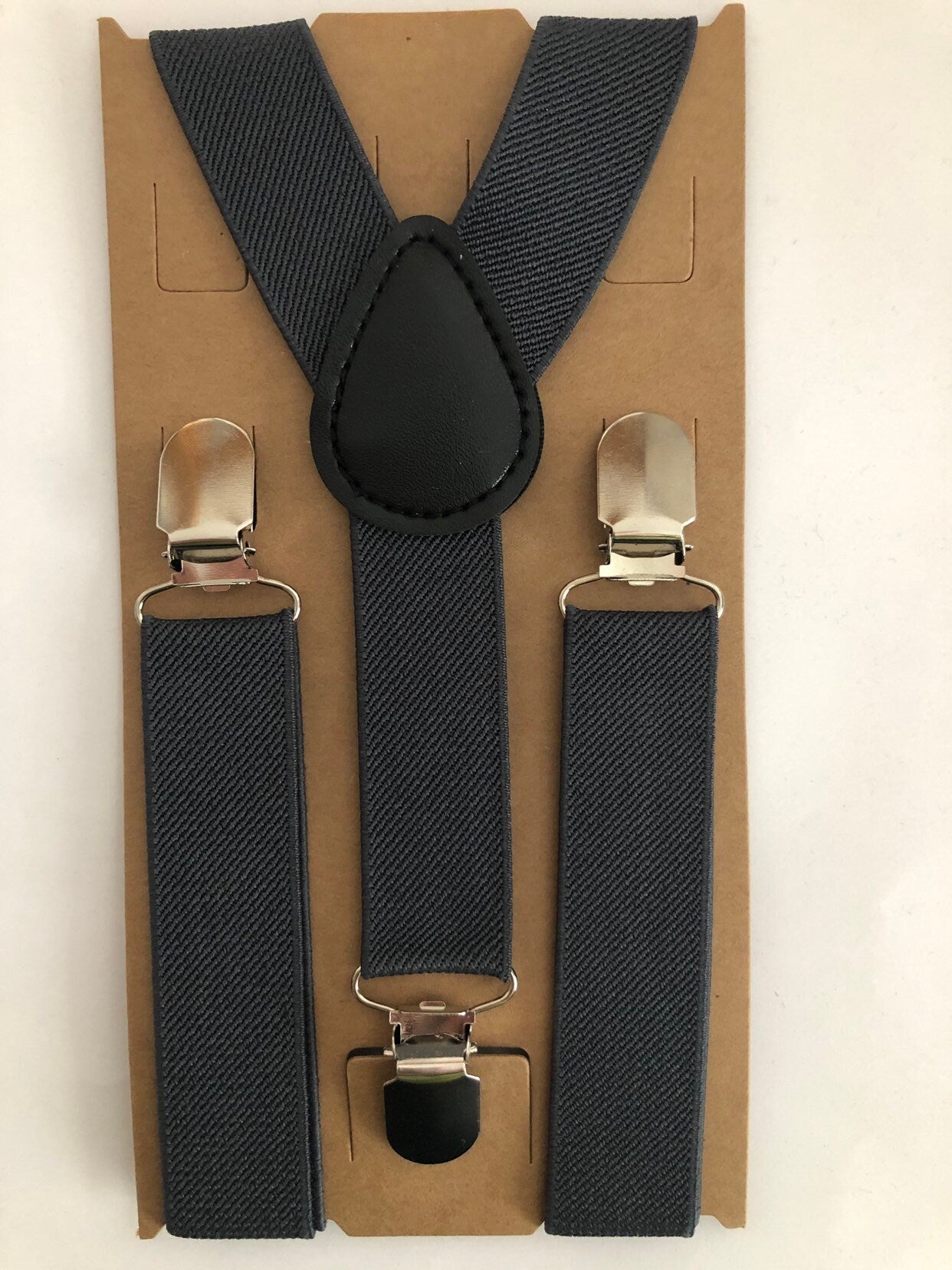 Champagne Bow Tie and Dark Grey Suspenders.