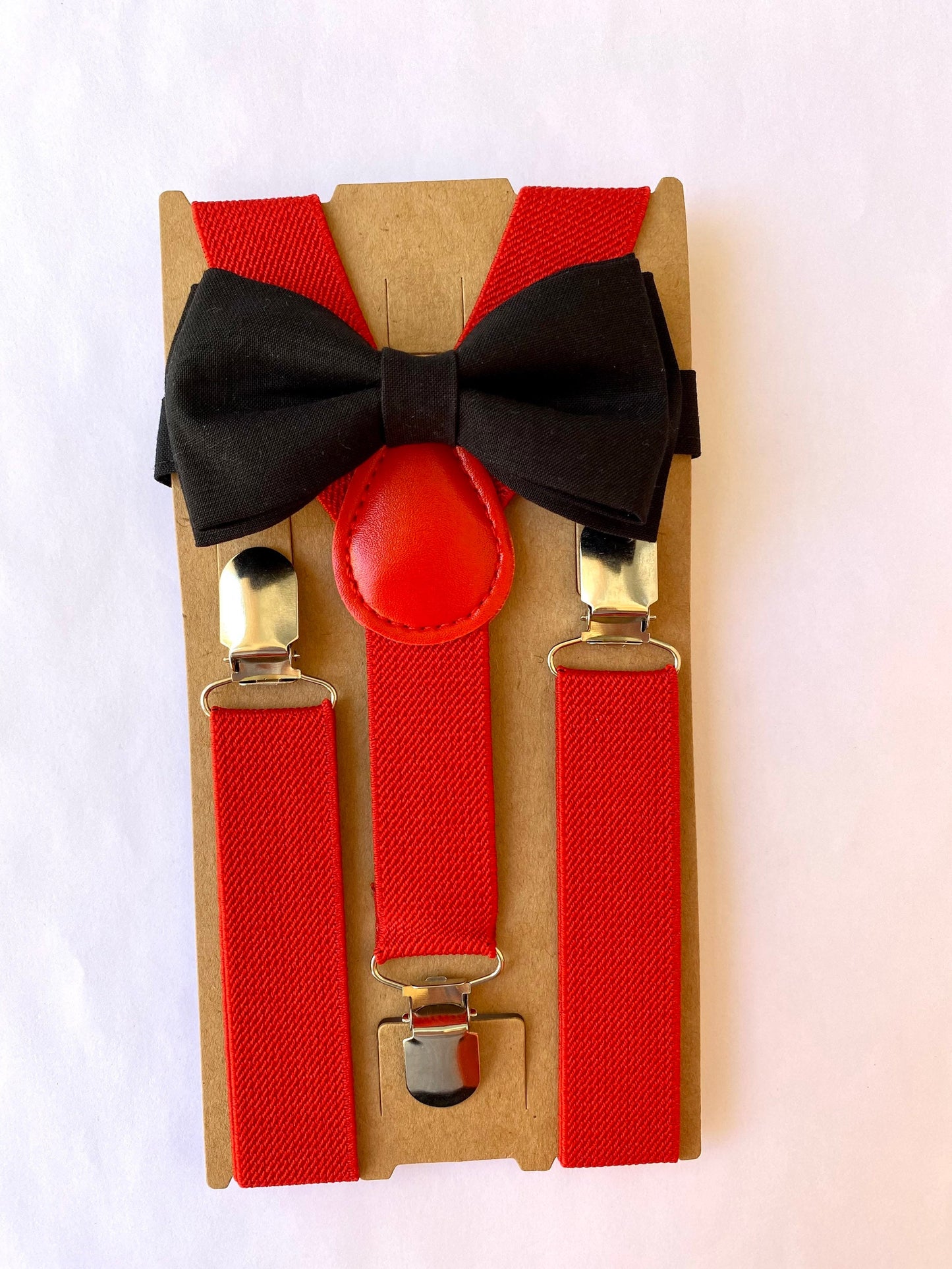 Black Bow Tie and Red Suspenders.