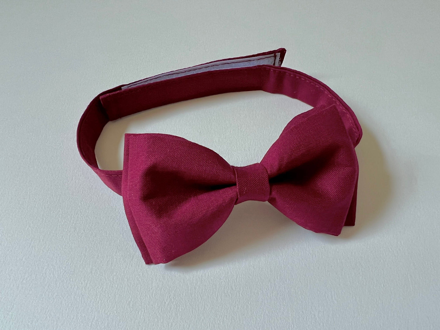 Burgundy Bow Tie and Grey Suspenders.